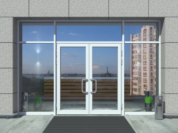 3D illustration. The facade of a modern shopping center or station, an airport with modern white office entrance door.  Source: https://www.istockphoto.com/es/foto/puerta-de-entrada-blanca-moderna-de-la-oficina-gm1166218092-321190245